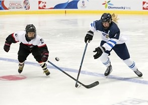 PREROV, CZECH REPUBLIC - JANUARY 08:  Finland's Petra Nieminen #9 and Japan's Remi Koyama #21 chase down a loose puck during preliminary round action at the 2017 IIHF Ice Hockey U18 Women's World Championship. (Photo by Steve Kingsman/HHOF-IIHF Images)

